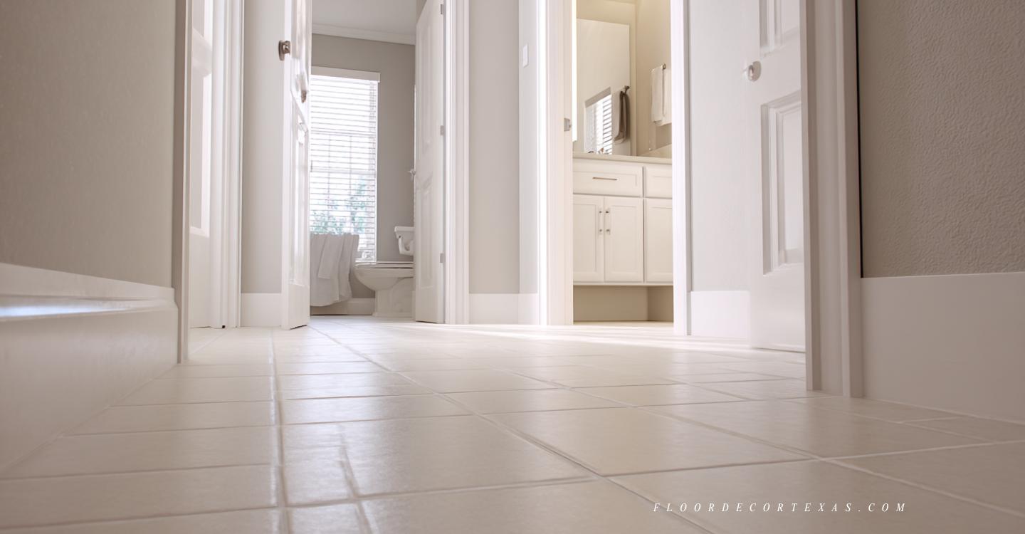 12x12 beige ceramic tile floor in Texas hallway and guest bathroom cutaway view