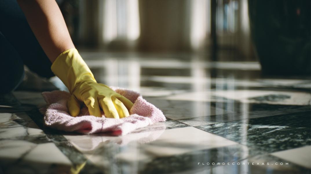 Homeowner cleaning granite and sealing marble floor