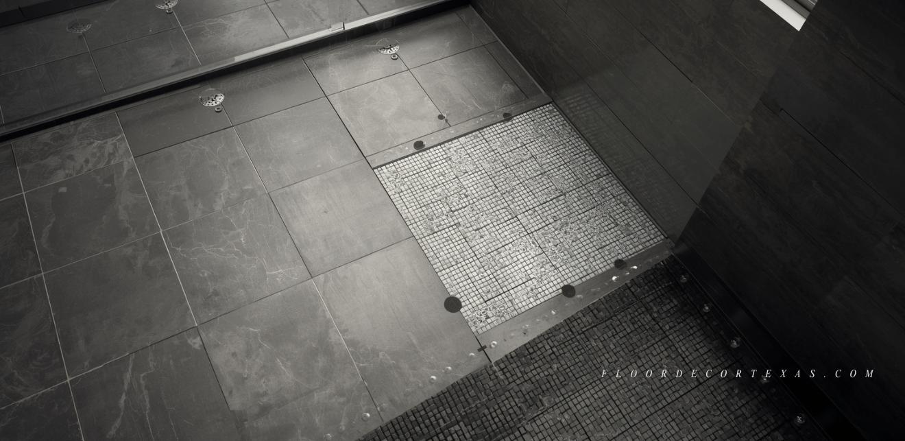 Visual layout of bathroom zones with different tile surfaces and slip resistance levels